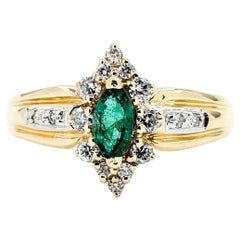 Exquisite Halo Emerald and Diamond Ring in 14k Yellow Gold