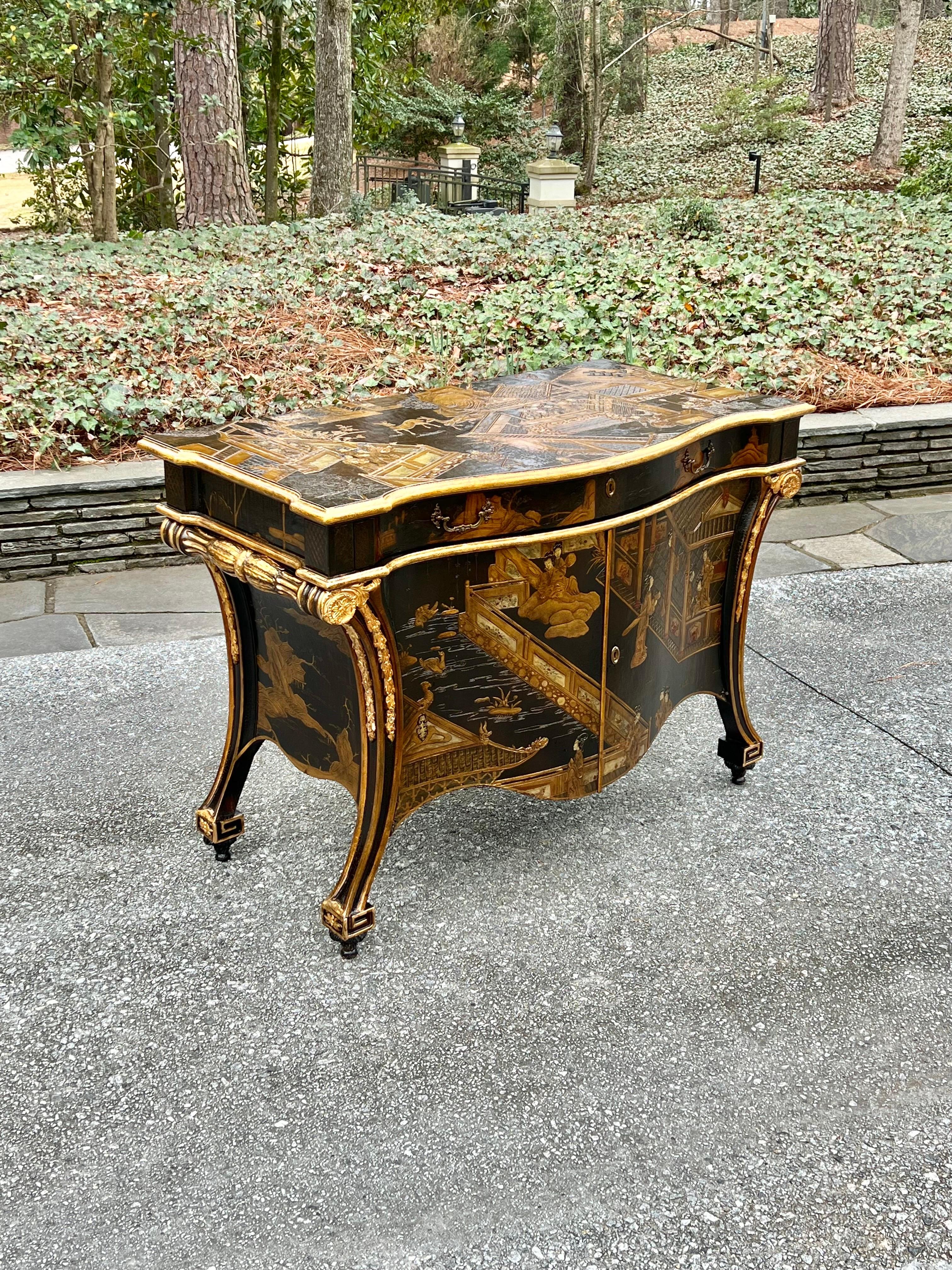This magnificent commode is shipped as professionally photographed and described in the listing narrative: Meticulously professionally restored and completely installation ready.

An exquisite Chippendale style hand pained chinoiserie commode in