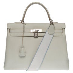 Exquisite Hermès Kelly 35 retourne handbag strap in Gris Perle Togo leather , SHW