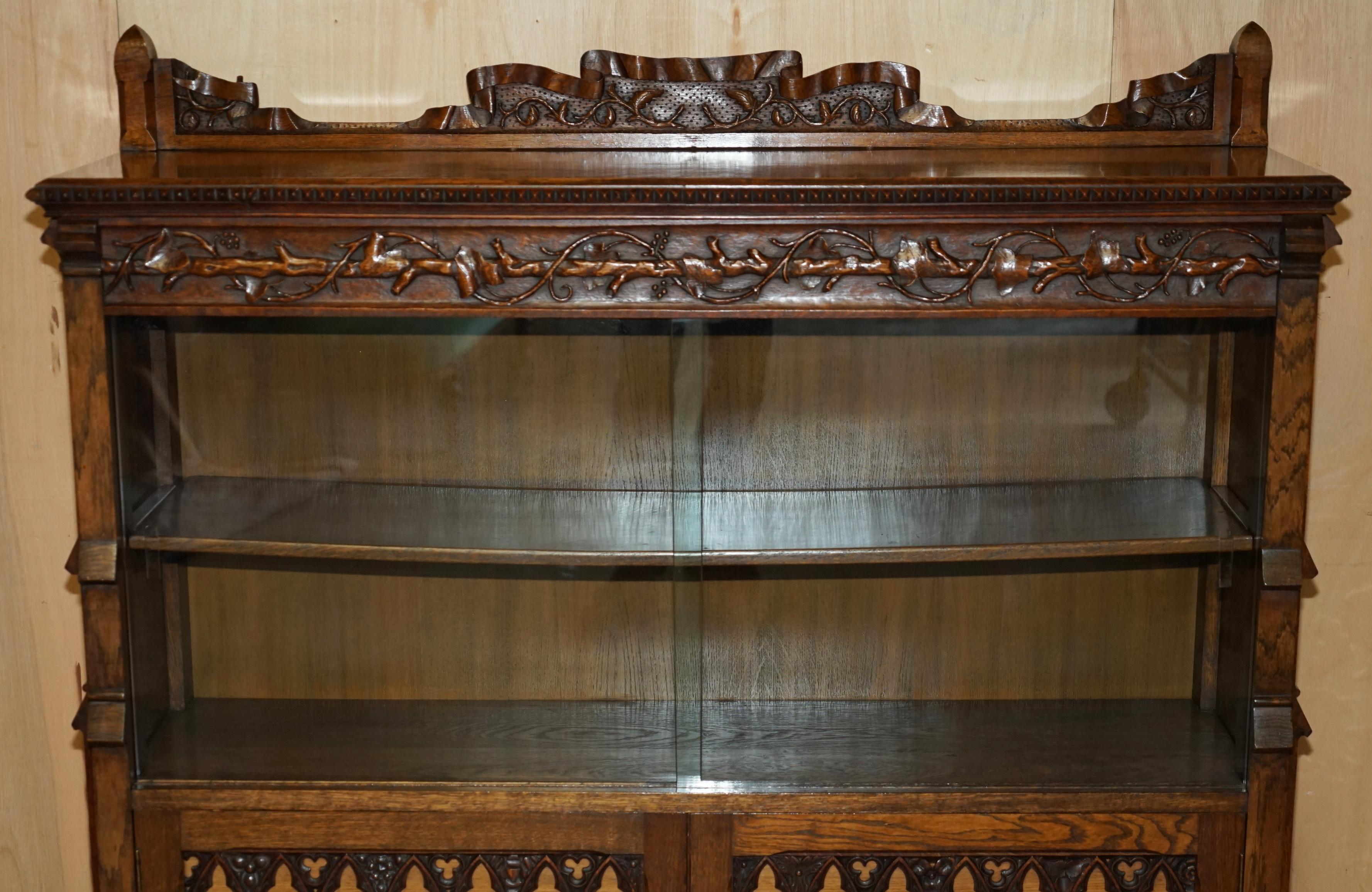 Hand-Crafted EXQUISiTE & IMPORTANT ORNATELY HAND CARVED GOTHIC REVIVAL PUGIN STYLE BOOKCASE For Sale