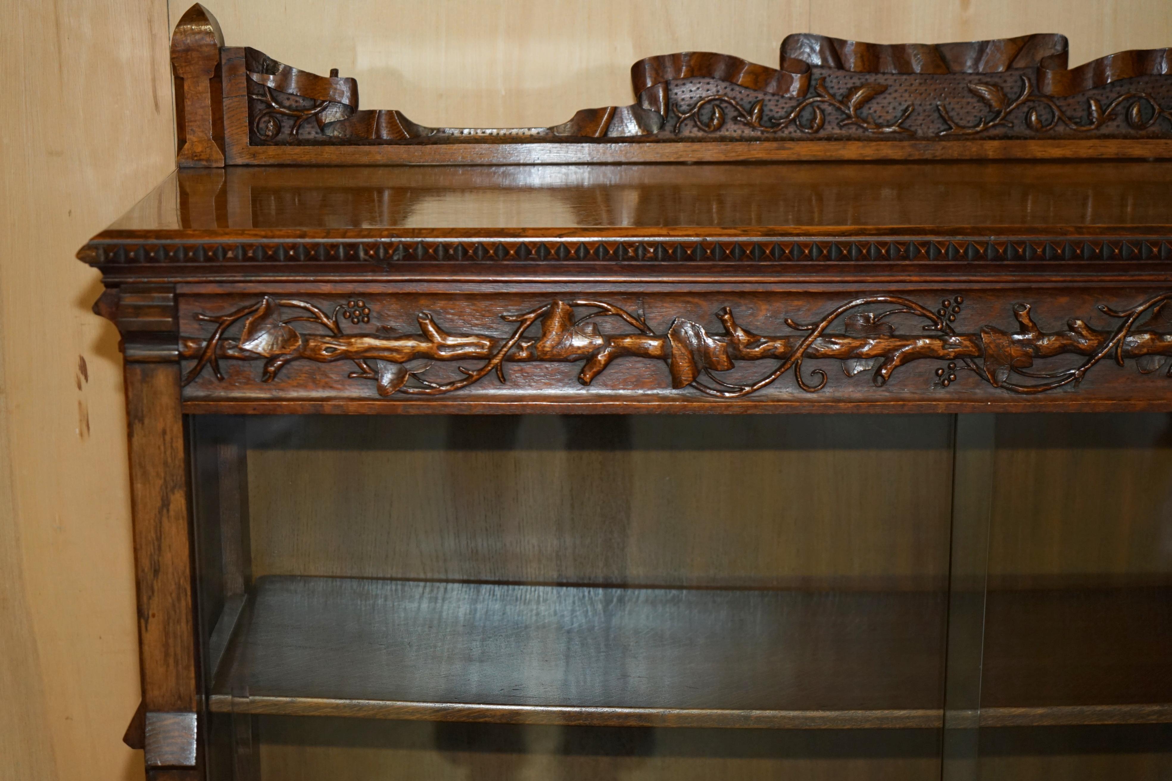 Glass EXQUISiTE & IMPORTANT ORNATELY HAND CARVED GOTHIC REVIVAL PUGIN STYLE BOOKCASE For Sale
