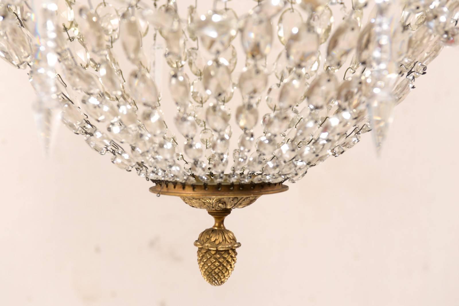 An Exquisite Italian Mid-century Basket-Shaped Crystal and Brass Chandelier For Sale 4