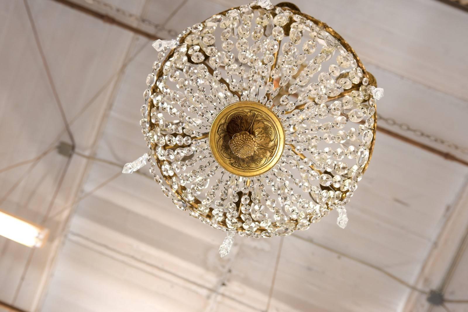 An Exquisite Italian Mid-century Basket-Shaped Crystal and Brass Chandelier For Sale 5