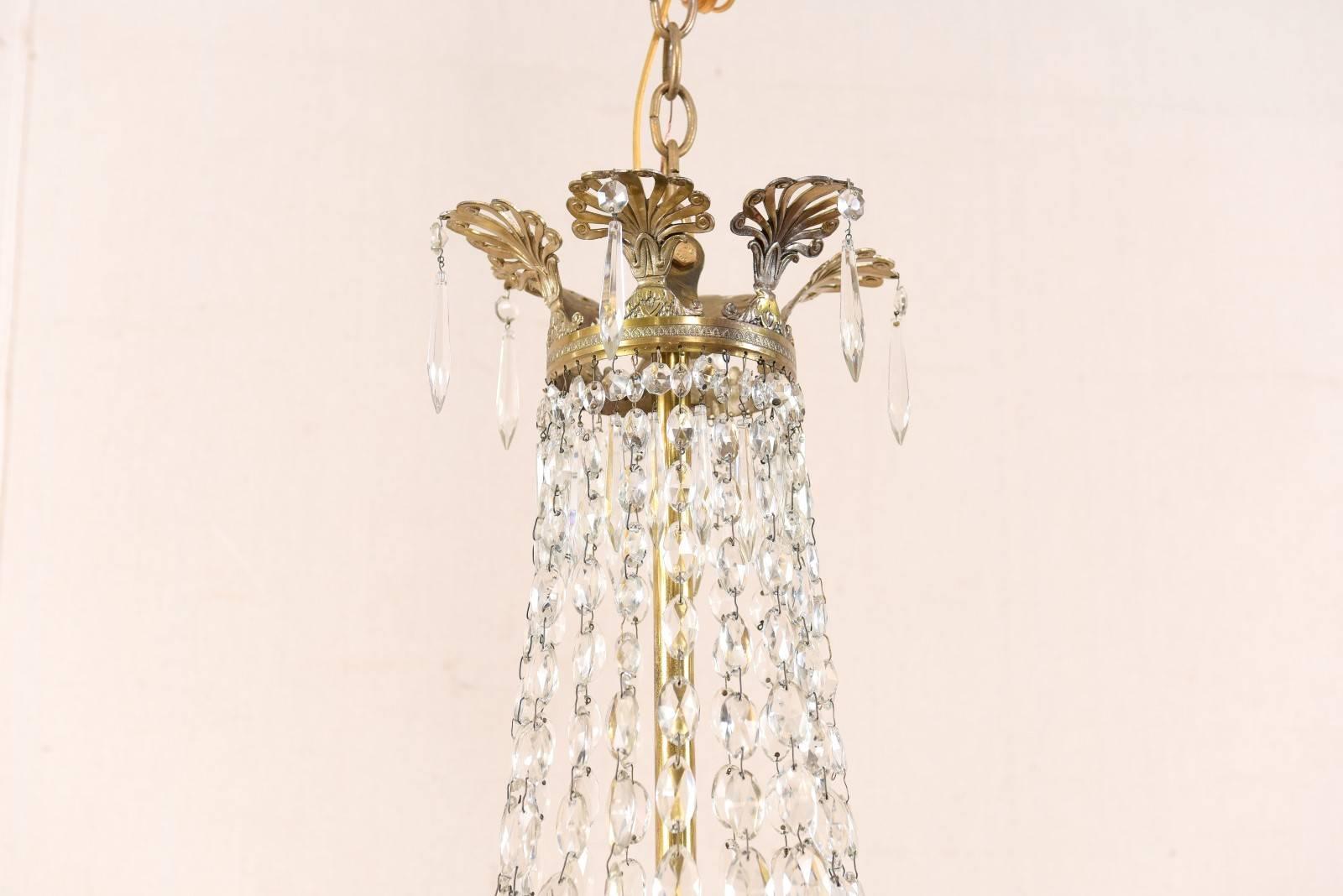 An Exquisite Italian Mid-century Basket-Shaped Crystal and Brass Chandelier In Good Condition For Sale In Atlanta, GA