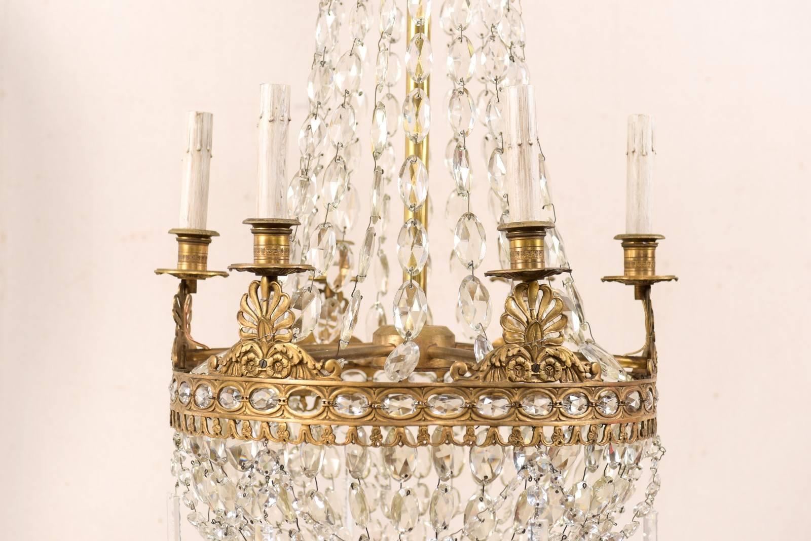 20th Century An Exquisite Italian Mid-century Basket-Shaped Crystal and Brass Chandelier For Sale