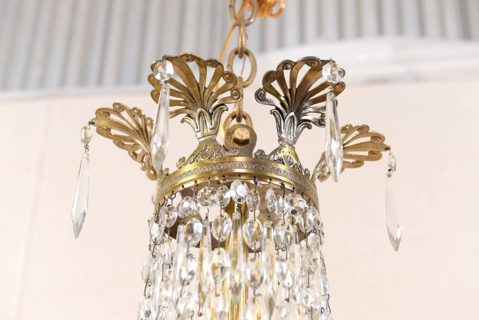 An Exquisite Italian Mid-century Basket-Shaped Crystal and Brass Chandelier For Sale 3