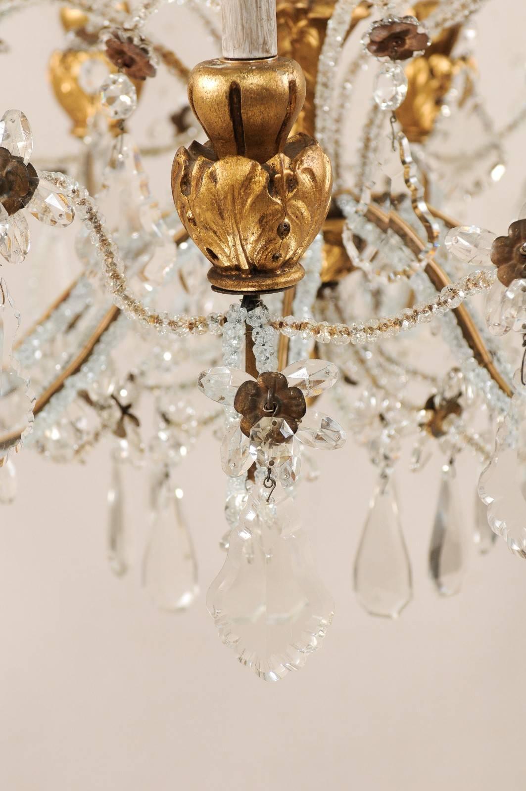 20th Century Exquisite Italian Vintage Gilded and Carved Wood Multi-Tiered Crystal Chandelier