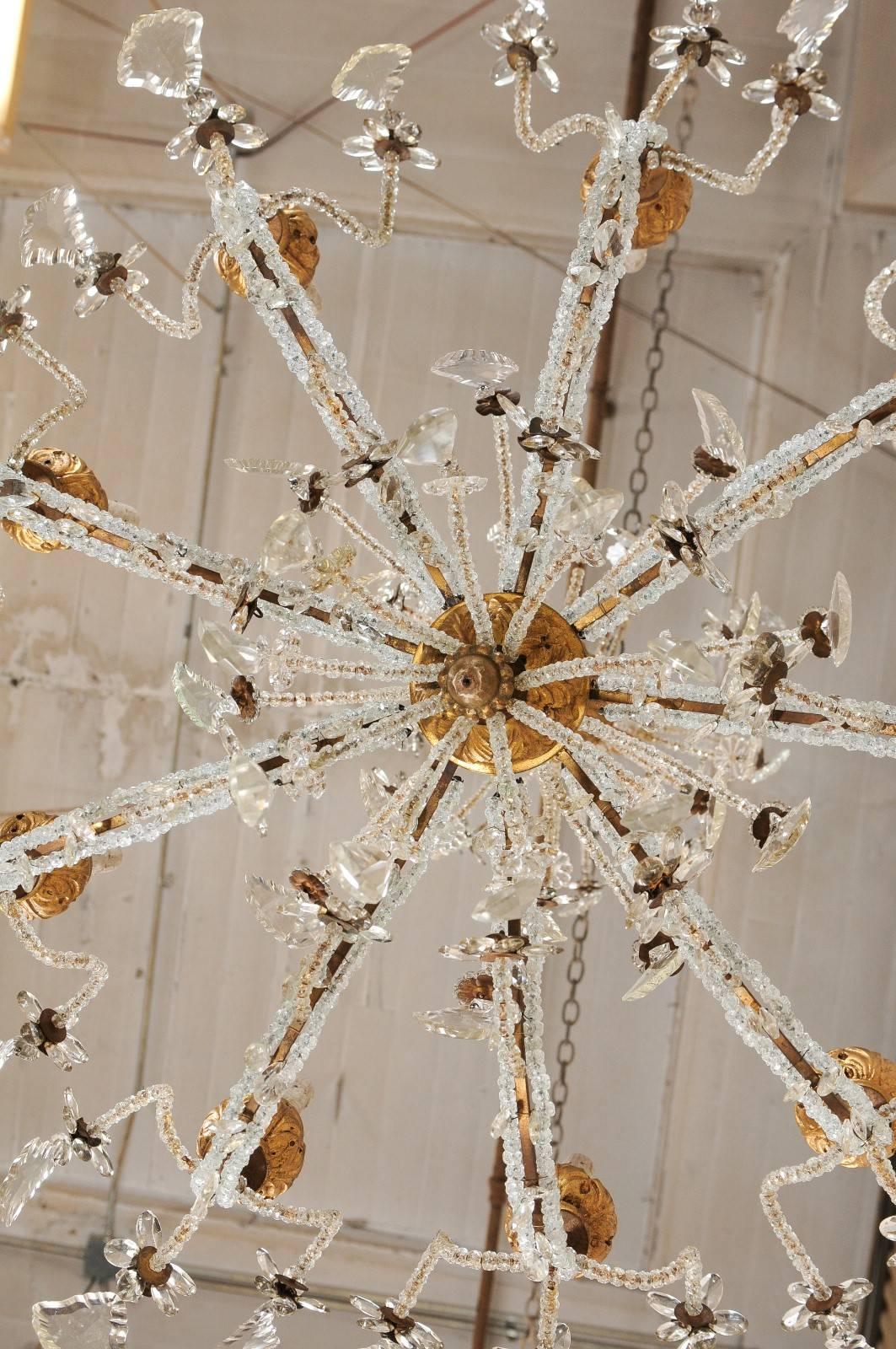 Metal Exquisite Italian Vintage Gilded and Carved Wood Multi-Tiered Crystal Chandelier