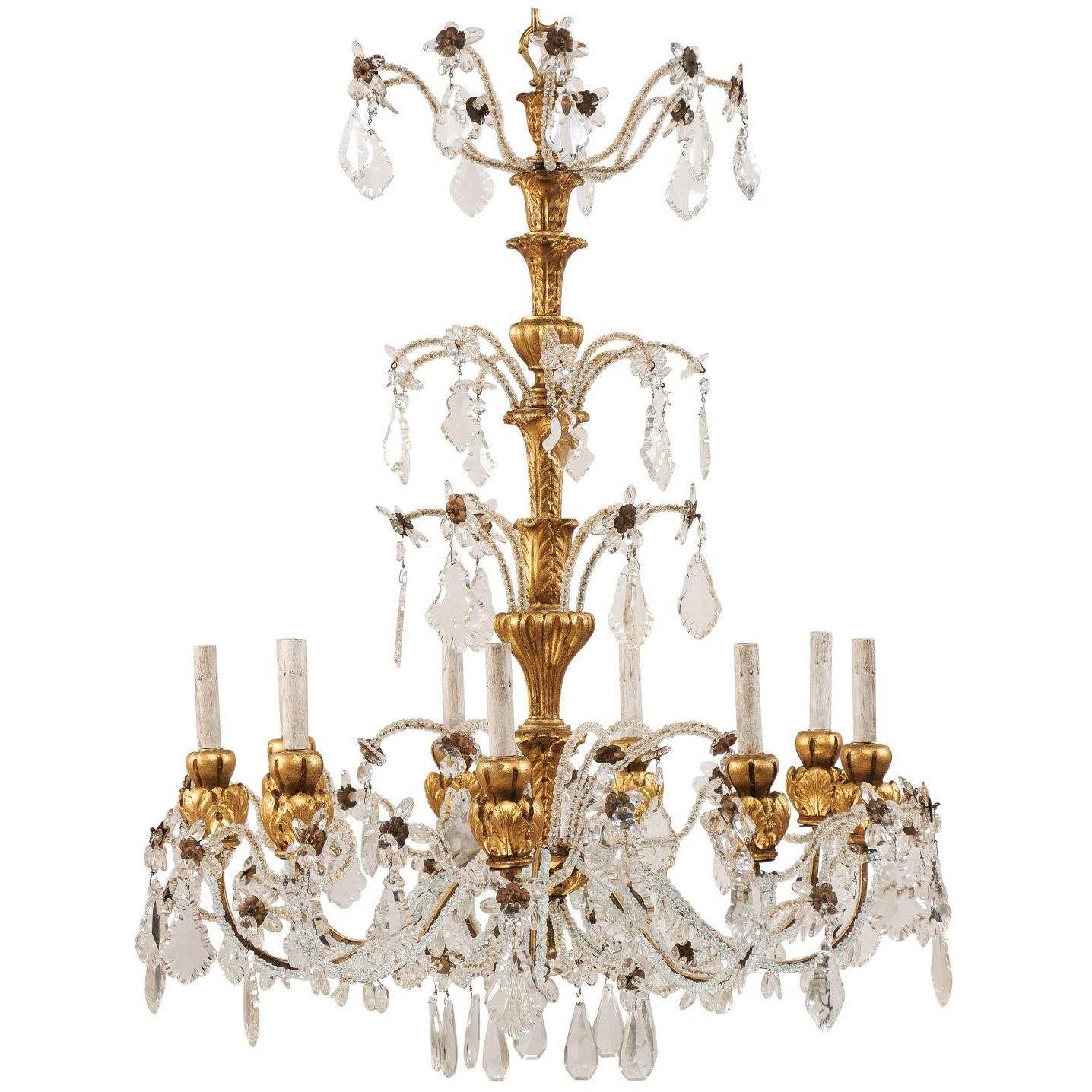 Exquisite Italian Vintage Gilded and Carved Wood Multi-Tiered Crystal Chandelier