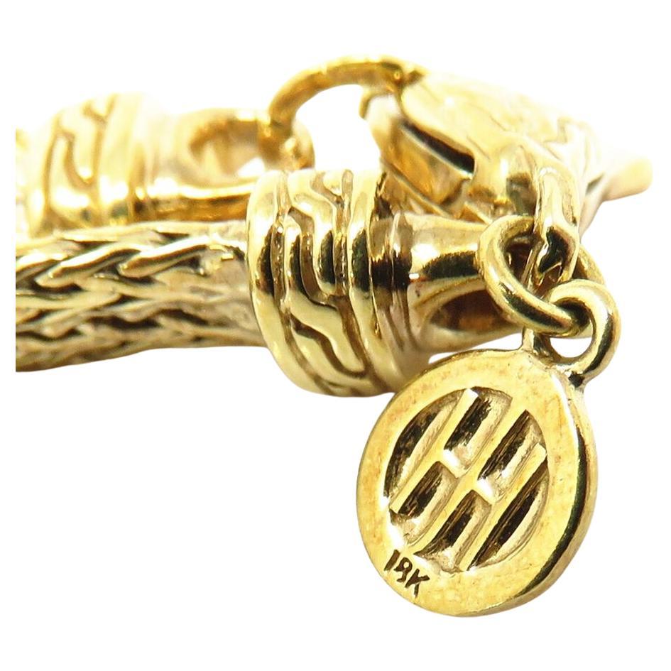 Exquisite John Hardy 18k Gold Necklace
Elevate your style with this luxurious John Hardy necklace, a testament to timeless elegance and masterful craftsmanship.

Specifications:

Length: 17 inches
Width: 2mm per strand
Material: 18k Gold,