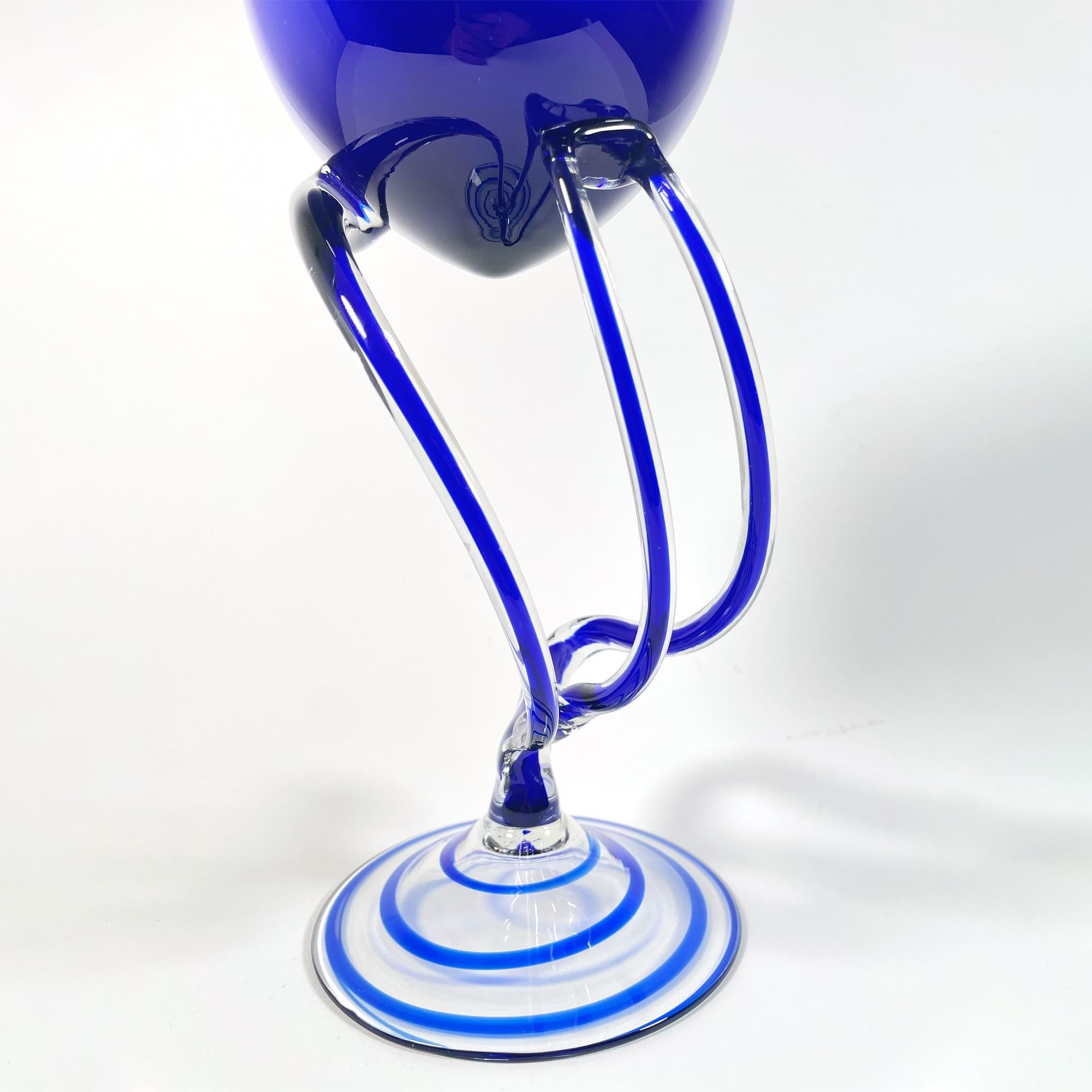Discover a stunning pair of Jozefina Krosno blue stemmed glasses, sold as a set, perfect for adding a touch of elegance to your collection. Crafted in the 1980s, these pieces showcase a beautiful combination of vibrant blue and delicate