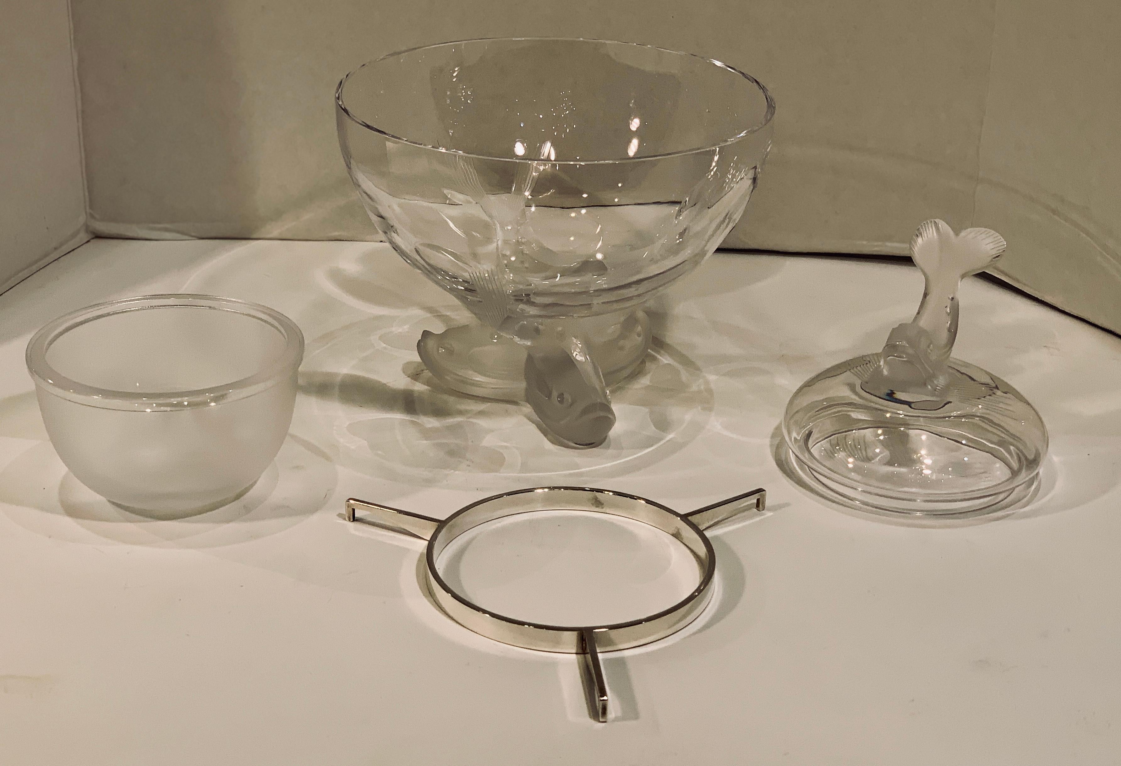 Very elegant, Igor dolphin design Lalique French crystal caviar bowl four piece serving dish features highly stylized, satin frosted and clear crystal dolphin lid handle and three satin frosted and clear crystal dolphin head pedestal base. Pebble