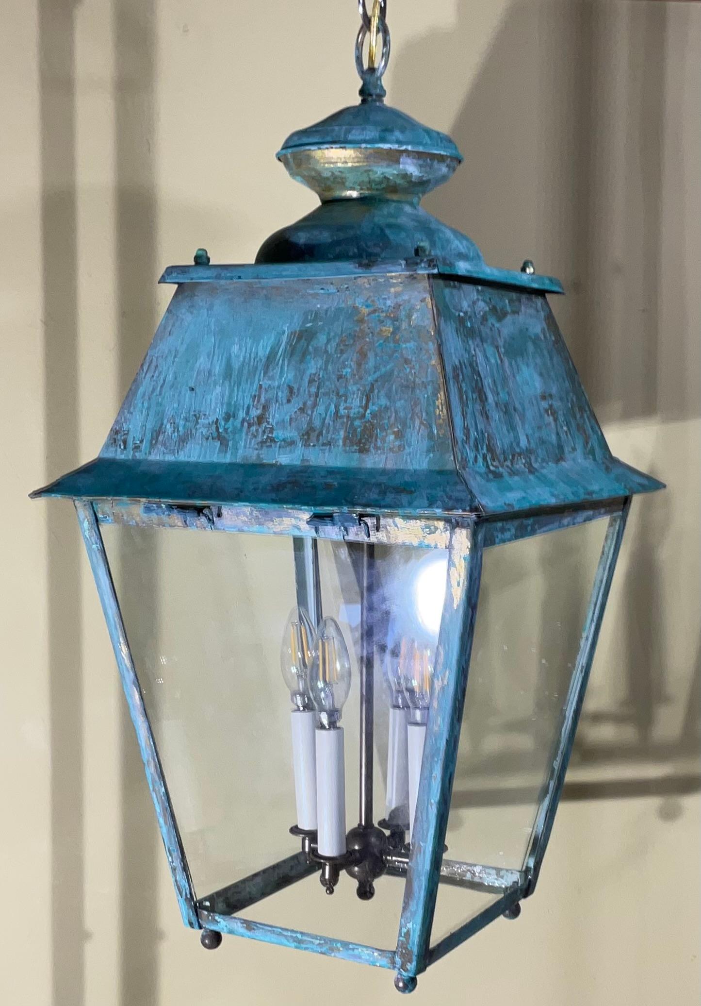 
A Timeless Statement Piece for Discerning Collectors and Decorators!
Elevate your home's aesthetic with this absolutely magnificent Vintage Solid Brass Hanging Lantern, featuring a rich, Verdigris Patina. This is more than just a light fixture;