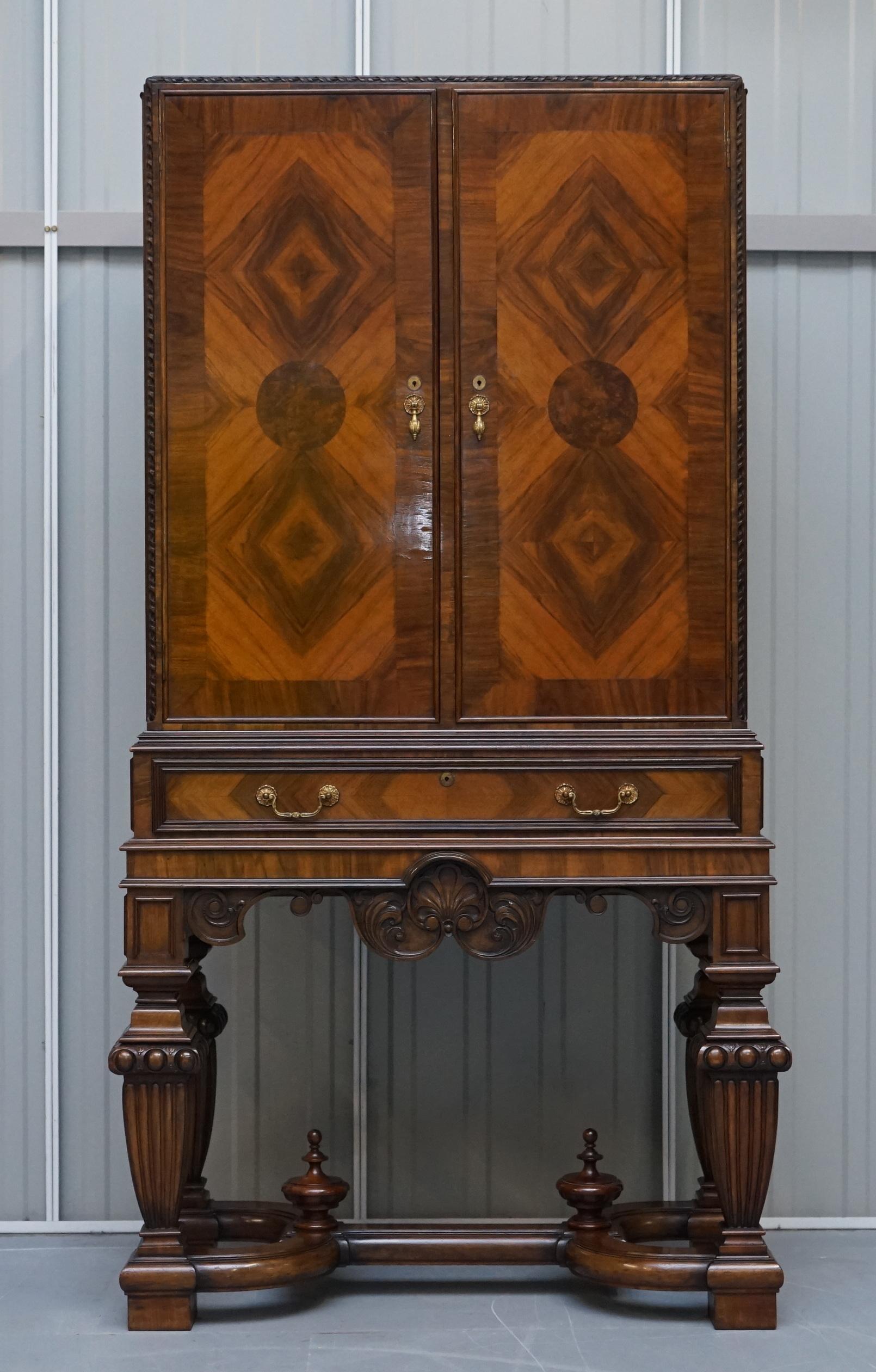 We are delighted to offer for sale this very fine original Victorian Liberty’s of London stamped burr walnut inlaid drinks cabinet with exceptional exhibition base

This is one of best drinks cabinets I have ever seen, the quality of the materials