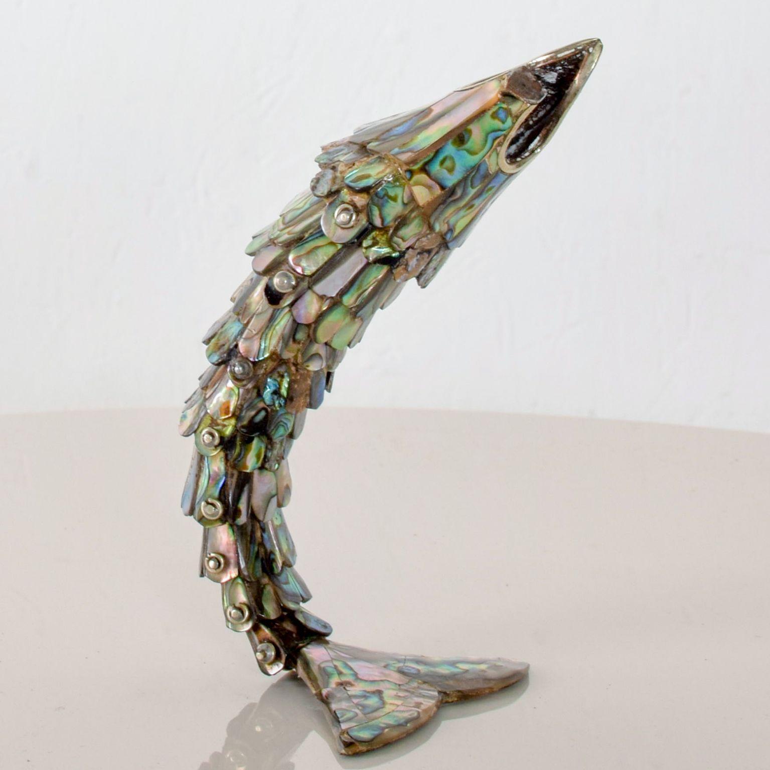 For you: Exquisite Los Castillo Abalone brass fish bottle opener Mexico 1970s no markings present. Dimensions: 8