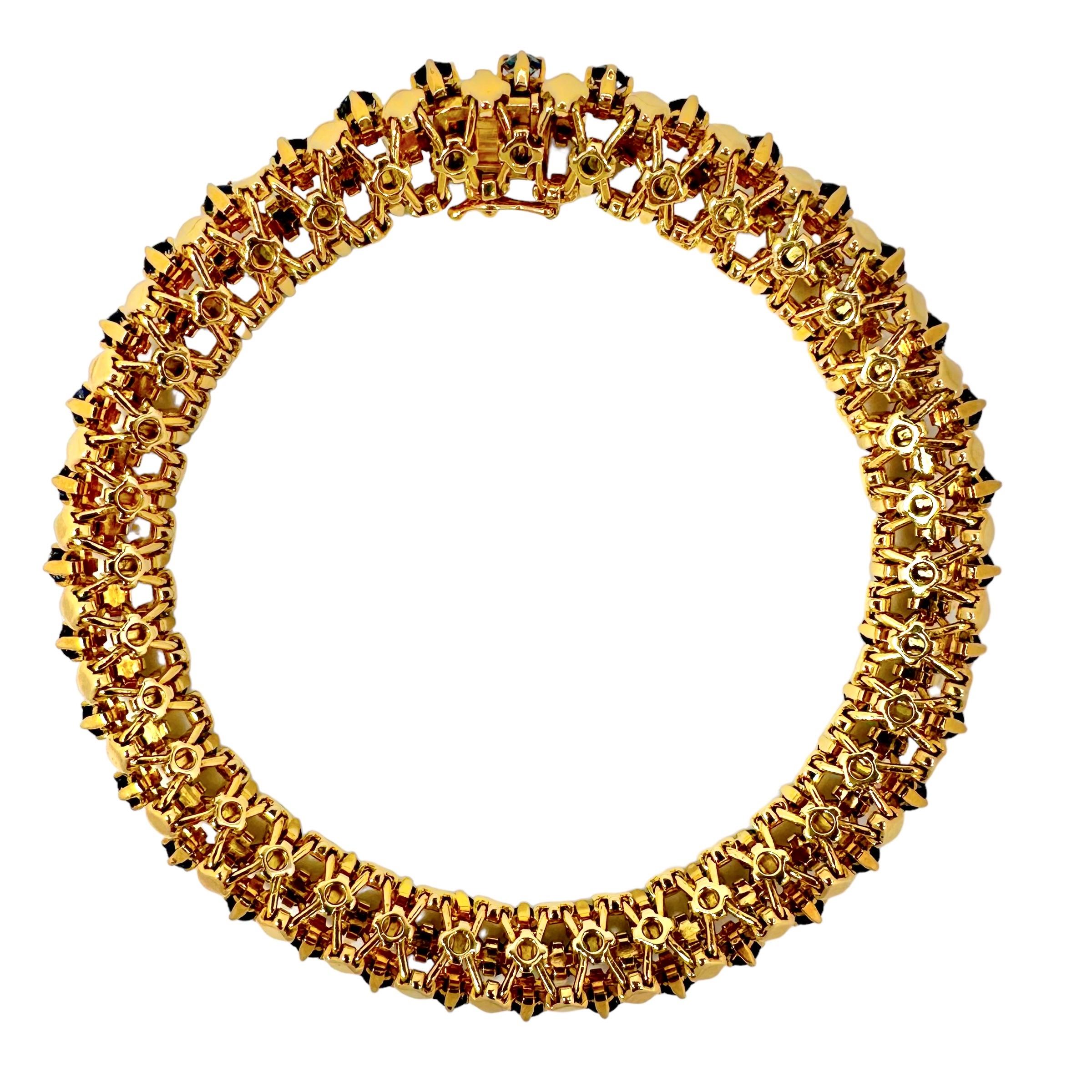 This exquisite, flexible, French Mid-Century 18k gold bracelet is almost entirely hand made and assembled, and displays all of the very best of fine jewelry crafting techniques. Due to its very precise and delicate construction, each and every link