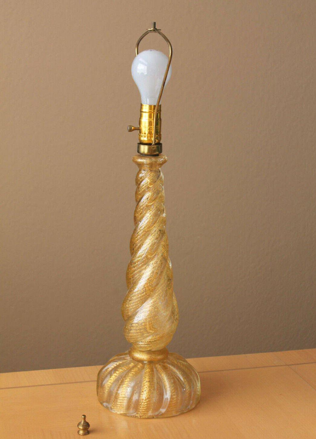 MAGNIFICENT!

BAROVIER & TOSO
MURANO
ITALIAN GLASS LAMP

FLOATING GOLD INCLUSION GLASS!

SIGNED

CIRCA:1950
 
DIMENSIONS:  APPROX.  25