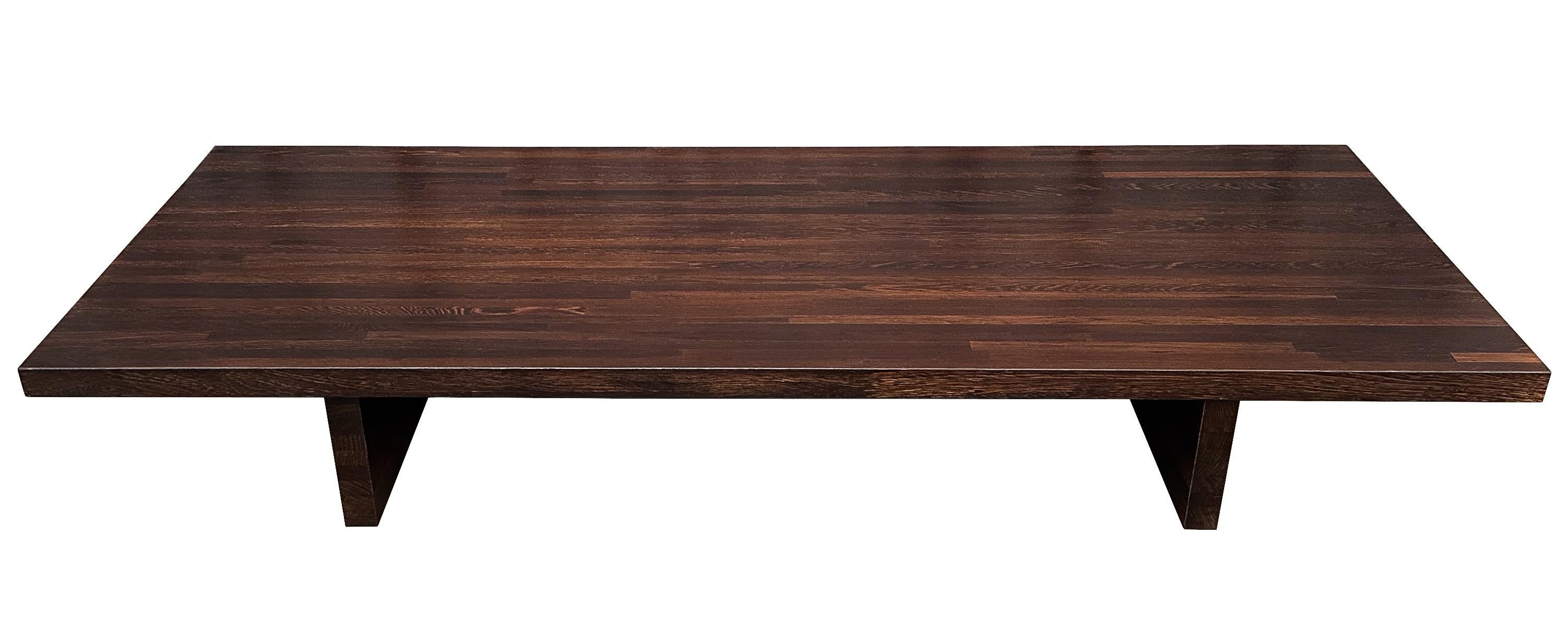 Elevate your living space with this modern solid wenge coffee table from Belgium, dating back to the 1970s. Evoking echoes of designs by the renowned Axel Vervoordt, this piece stands as a testament to impeccable craftsmanship and timeless taste.