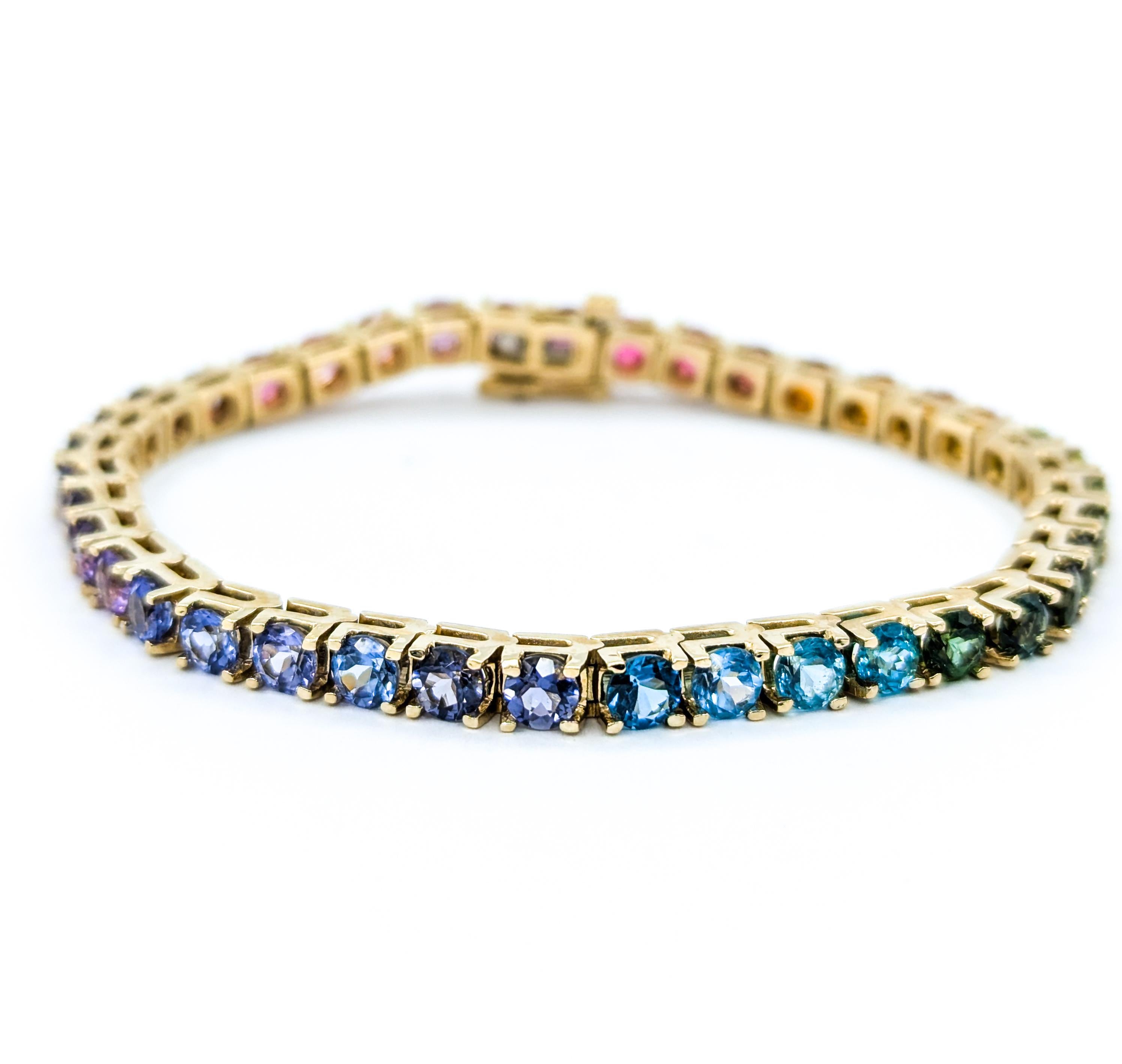 Exquisites Tennisarmband mit mehreren Edelsteinen aus 14k Gelbgold Damen
