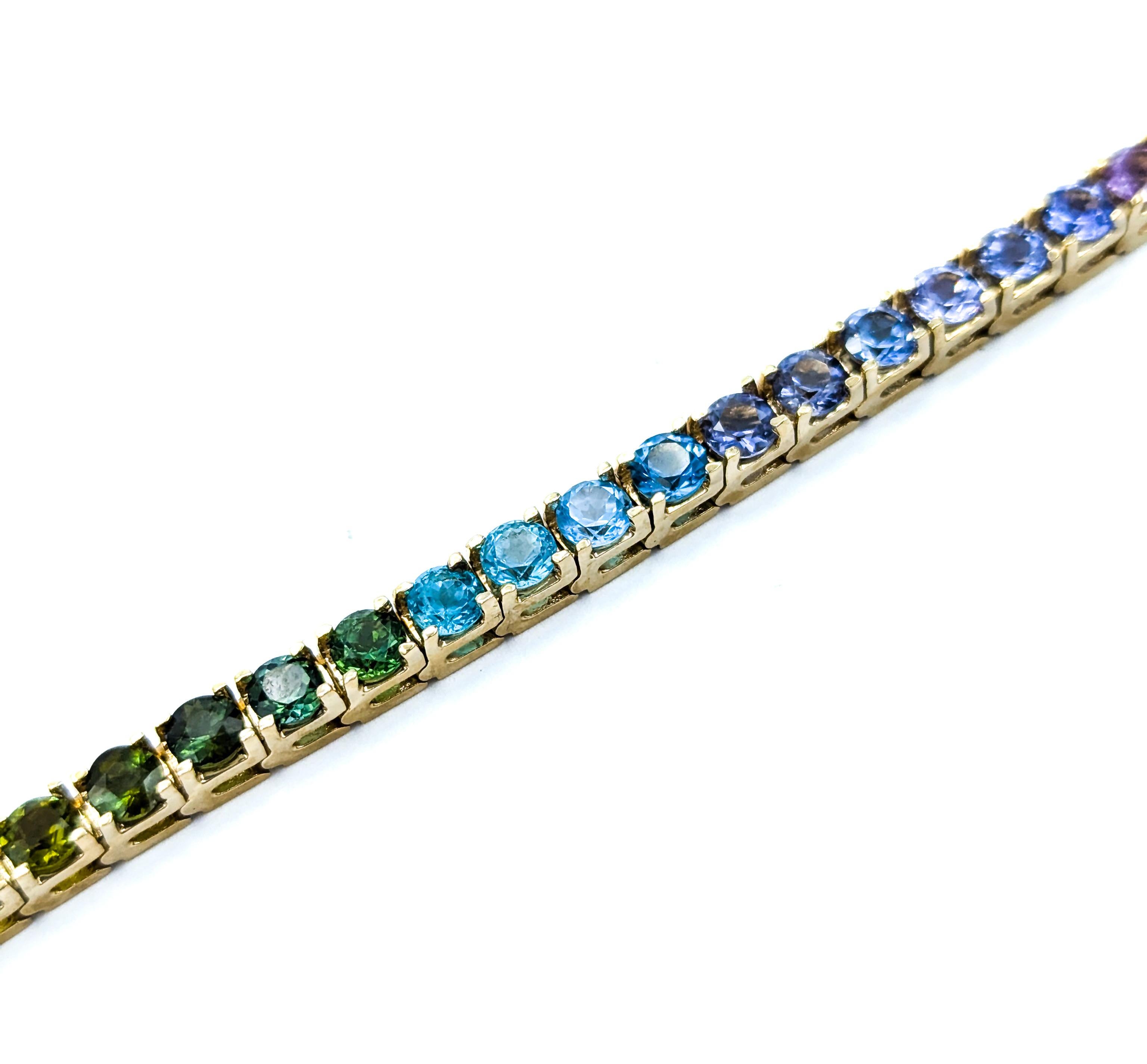 Exquisites Tennisarmband mit mehreren Edelsteinen aus 14k Gelbgold 2