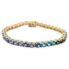 Exquisites Tennisarmband mit mehreren Edelsteinen aus 14k Gelbgold