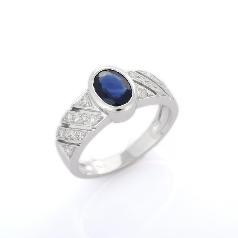 For Sale:  Exquisite Deep Blue Sapphire Diamond Engagement Ring in 18K White Gold 4