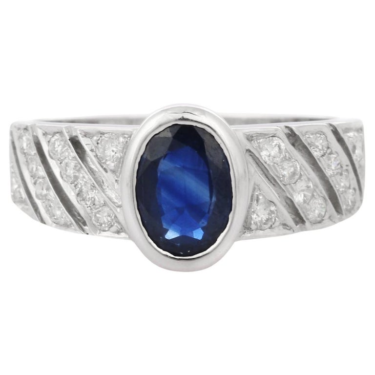 For Sale:  Exquisite Deep Blue Sapphire Diamond Engagement Ring in 18K White Gold