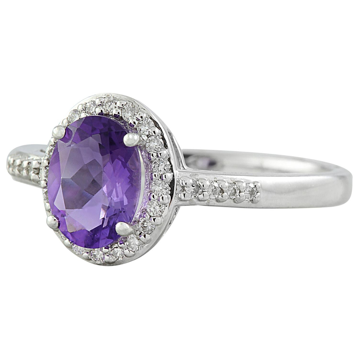 Introducing our exquisite 14K Solid White Gold Diamond Ring, adorned with a captivating 1.16 Carat Natural Amethyst. Crafted to perfection, this stunning piece is stamped with the hallmark of authenticity, ensuring its quality. With a total weight