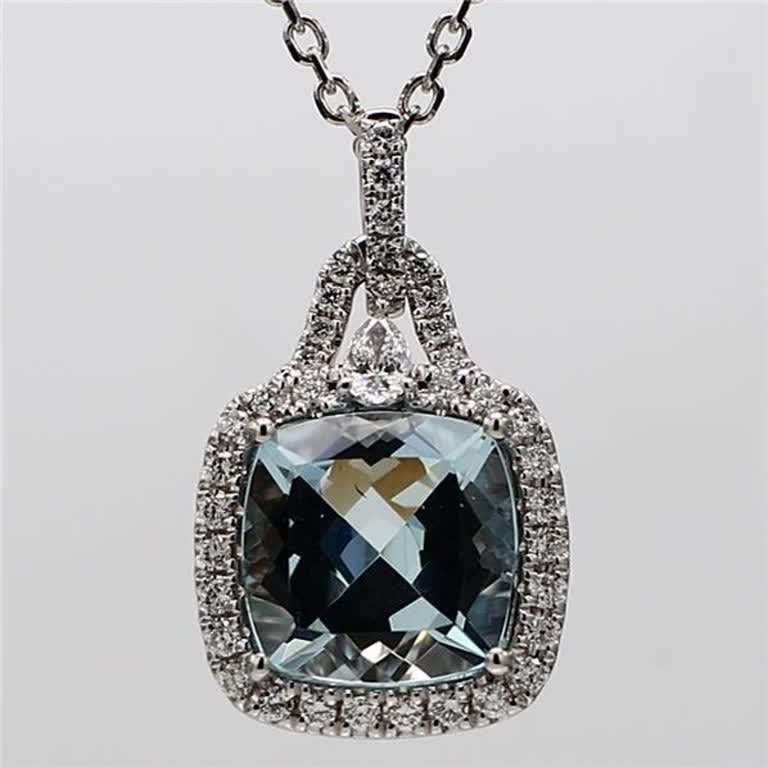 RareGemWorld's classic aqua-marine pendant. Mounted in a beautiful 14K White Gold setting with a natural cushion cut aqua-marine. The aqua-marine is surrounded by natural round cut white diamond melee. This pendant is guaranteed to impress and