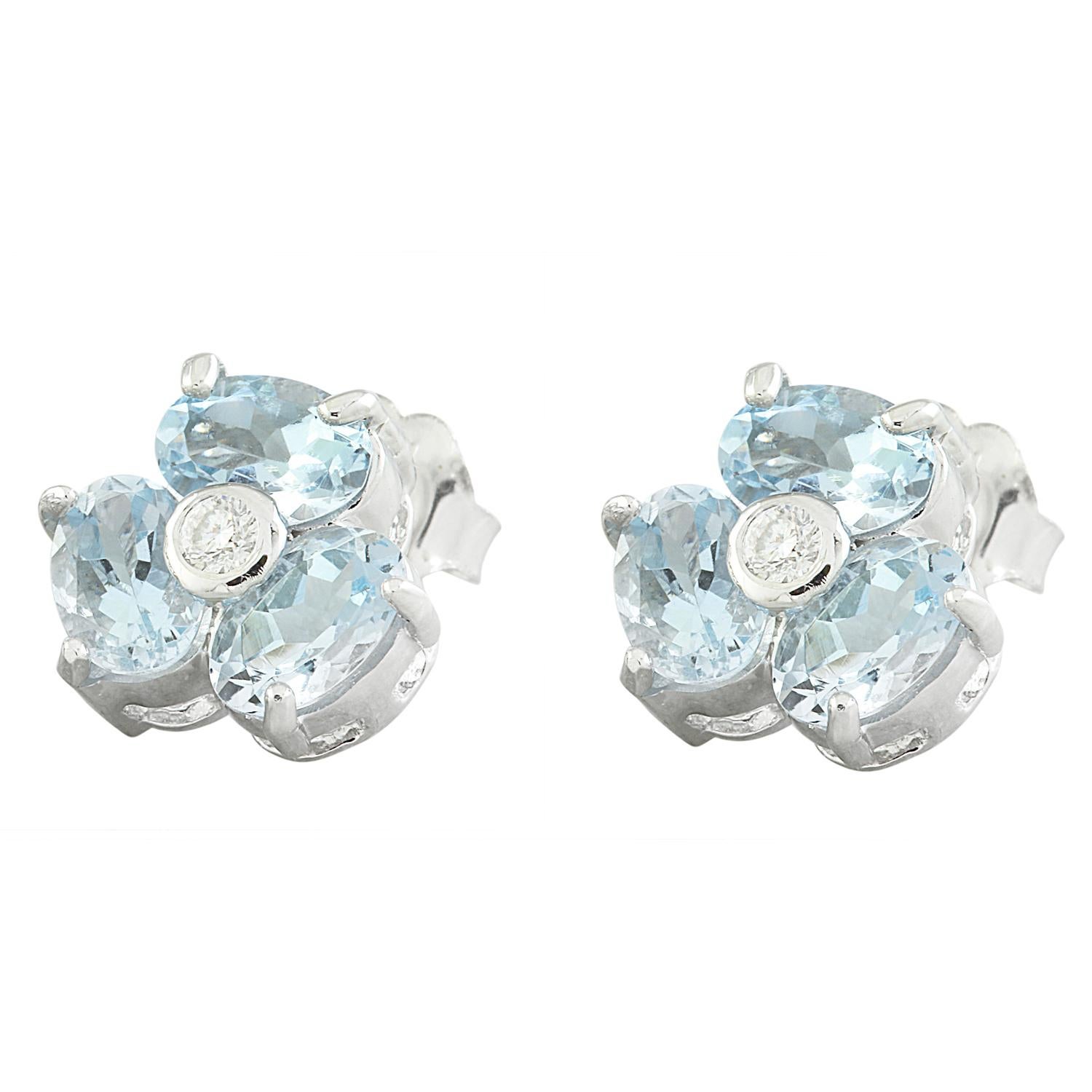 Indulge in the ethereal beauty of these captivating Natural Aquamarine Diamond Earrings, exquisitely crafted in luxurious 14 Karat White Gold. A harmonious fusion of elegance and sophistication. Earring features a dazzling 2.51 carat