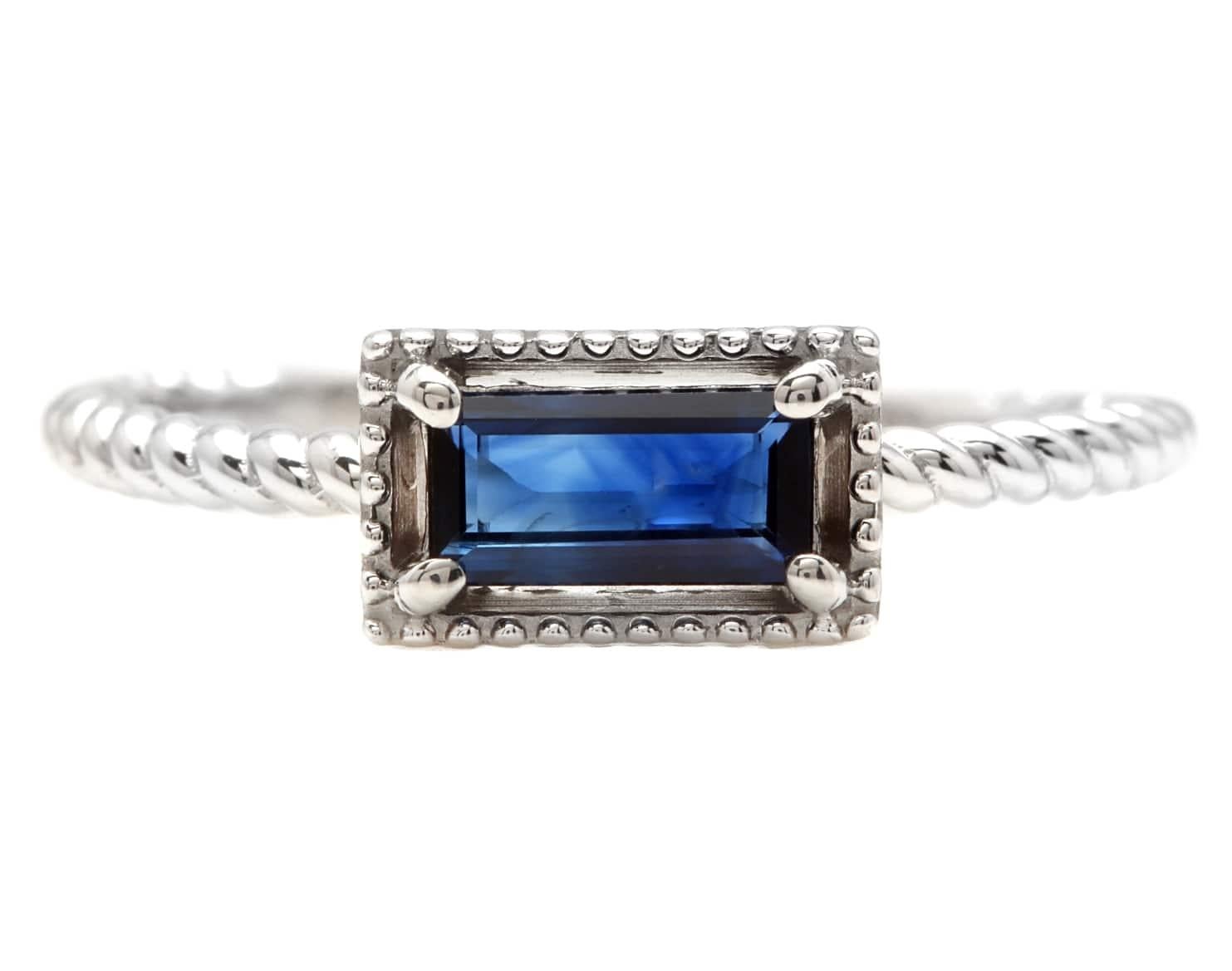 Exquisite Natural Blue Sapphire 14K Solid White Gold Ring

Total Natural Baguette Cut Sapphire Weights: Approx. 0.60 Carat (Heated)

Sapphire Measures: 6.60 x 3.40mm

Ring size: 7.25 (free re-sizing available)

Ring total weight: Approx. 2.0