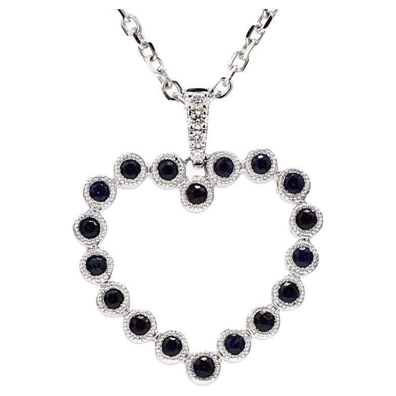 Natural Blue Round Sapphire and White Diamond .37 Carat TW White Gold Pendant For Sale