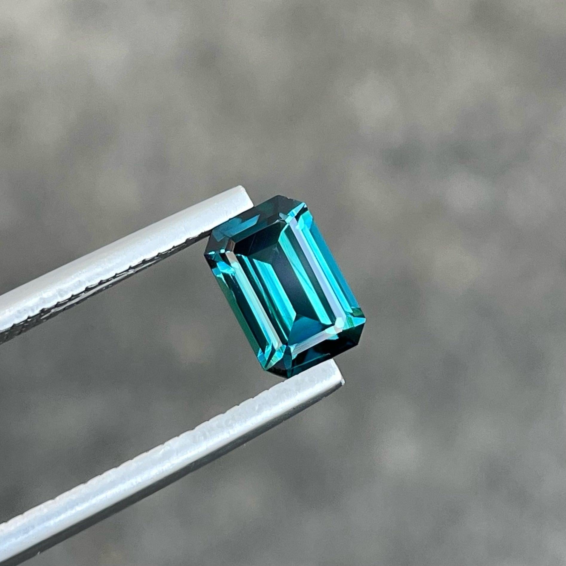 Exquisite Natural Blue Tourmaline Gemstone, available for sale at wholesale price, Loupe Clean Clarity, loose gemstone, Emerald Cut, 1.30 carats certified Tourmaline from Afghanistan.

Product Information:
GEMSTONE TYPE:	Exquisite Natural Blue