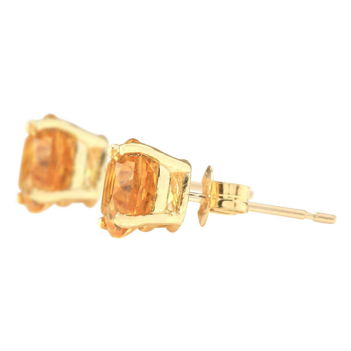 Introducing our elegant 14K Yellow Gold Earrings adorned with exquisite 3.00 Carat Citrine gemstones. These earrings are stamped for authenticity and weigh a total of 1.2 grams. The Citrine gemstones, each weighing 3.00 Carats, radiate with a warm