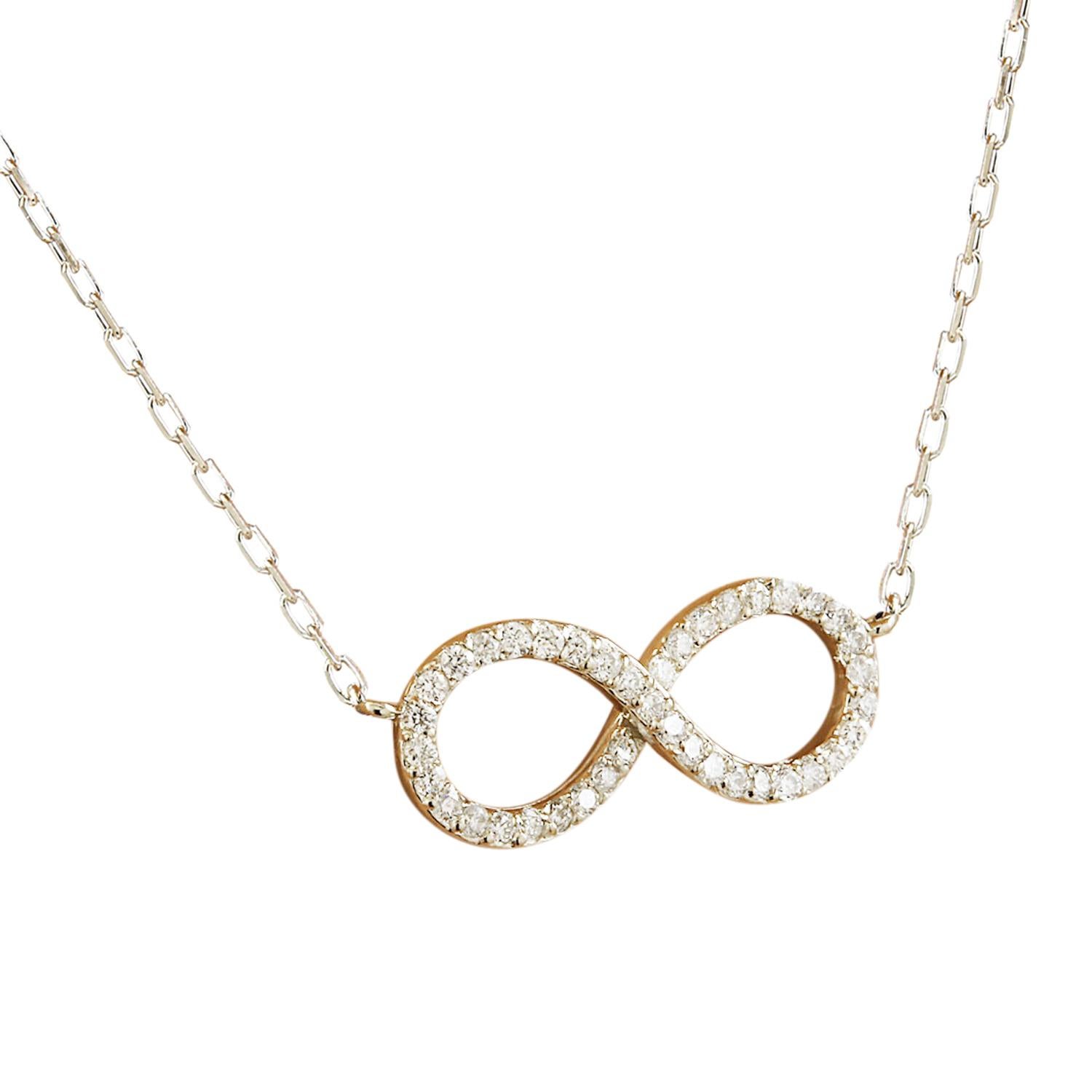 Introducing our stunning 0.30 Carat Natural Diamond Infinity Necklace in 14 Karat White Gold. Stamped with 14K authenticity, this necklace weighs 2.7 grams and measures 16 inches in length. Adorning the infinity symbol are 40 natural diamonds,