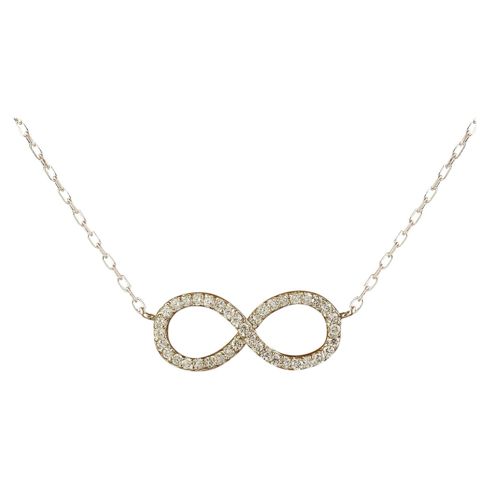 Exquisite Natural Diamond Infinity Necklace In 14 Karat White Gold  For Sale