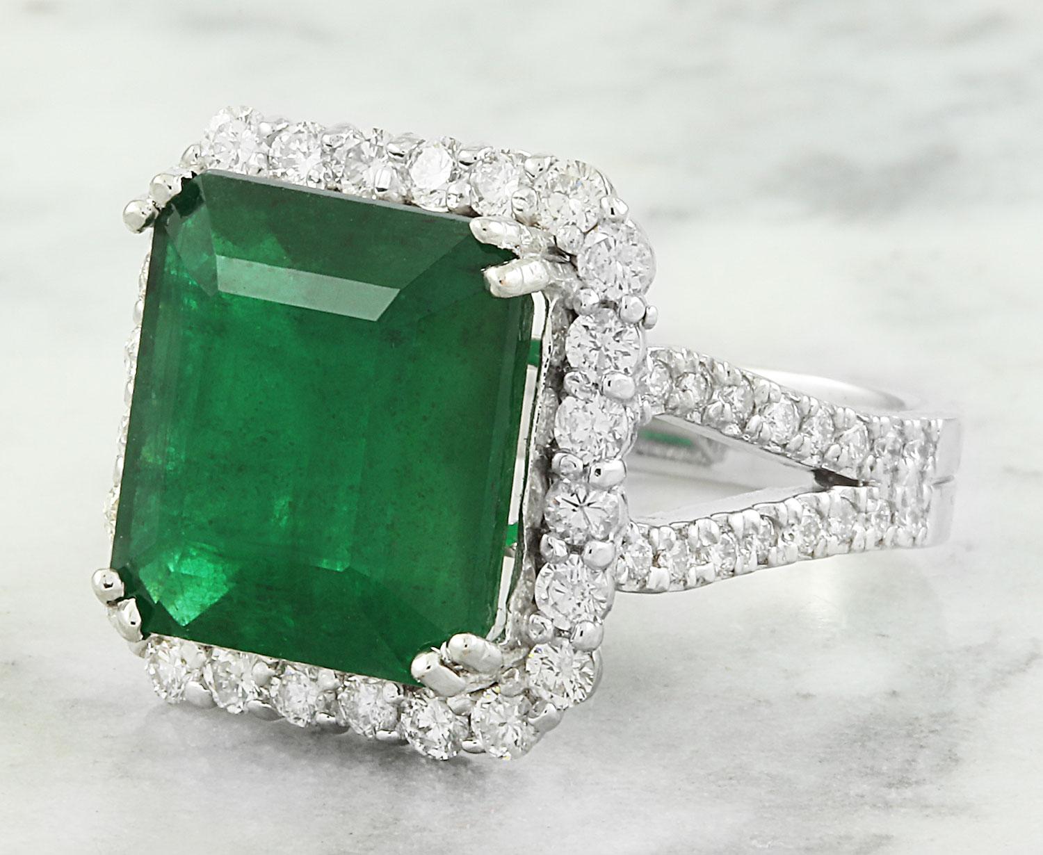Introducing our exquisite 11.30 Carat Natural Emerald Ring, crafted with precision in luxurious 14K Solid White Gold. Stamped for authenticity, this ring boasts a total weight of 10.8 grams, ensuring durability and quality. The centerpiece is a