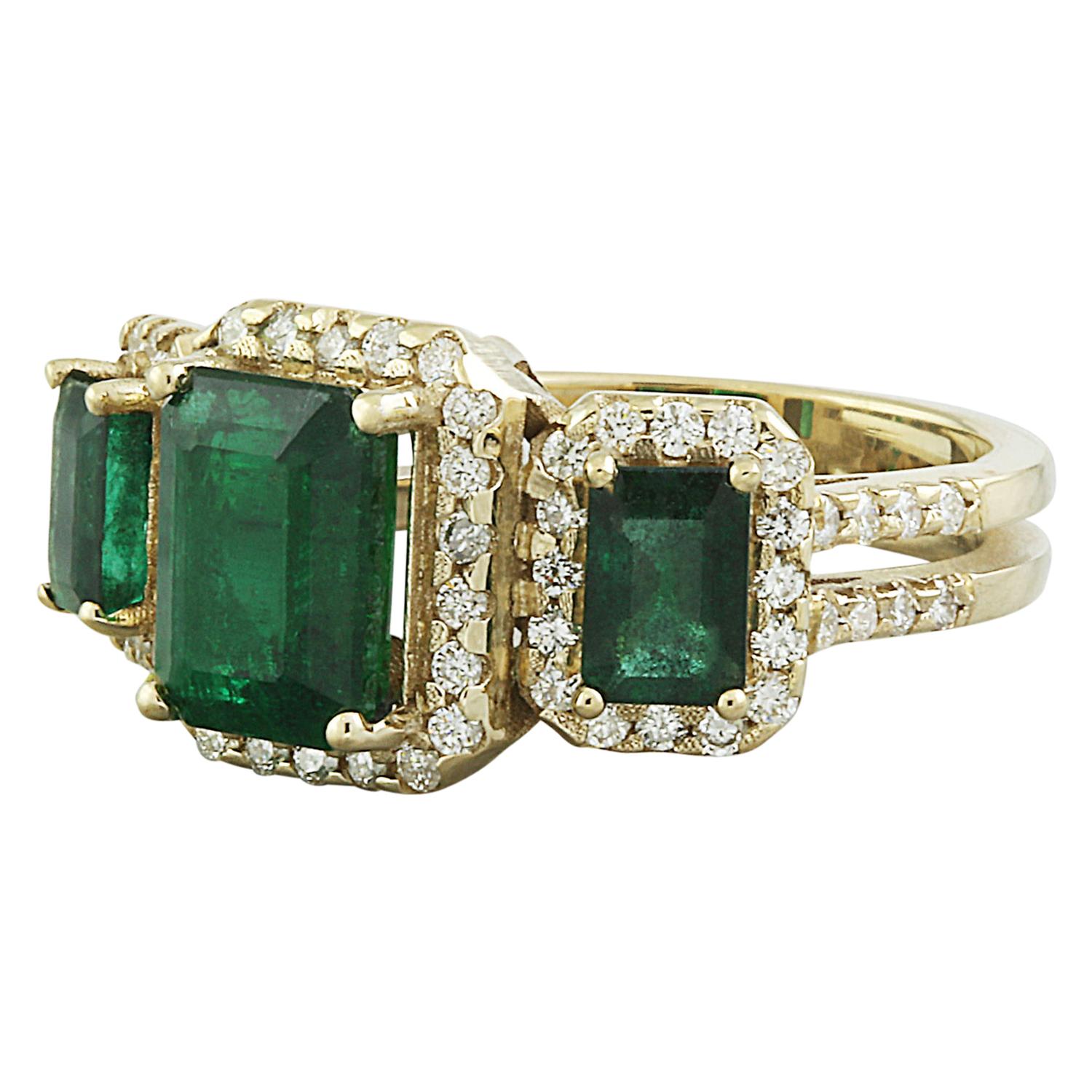 Introducing our captivating 4.21 Carat Natural Emerald 14K Solid Yellow Gold Diamond Ring, a true testament to elegance and sophistication. Authenticated with a 14K stamp, this ring weighs 7.7 grams, ensuring both quality and durability. At its