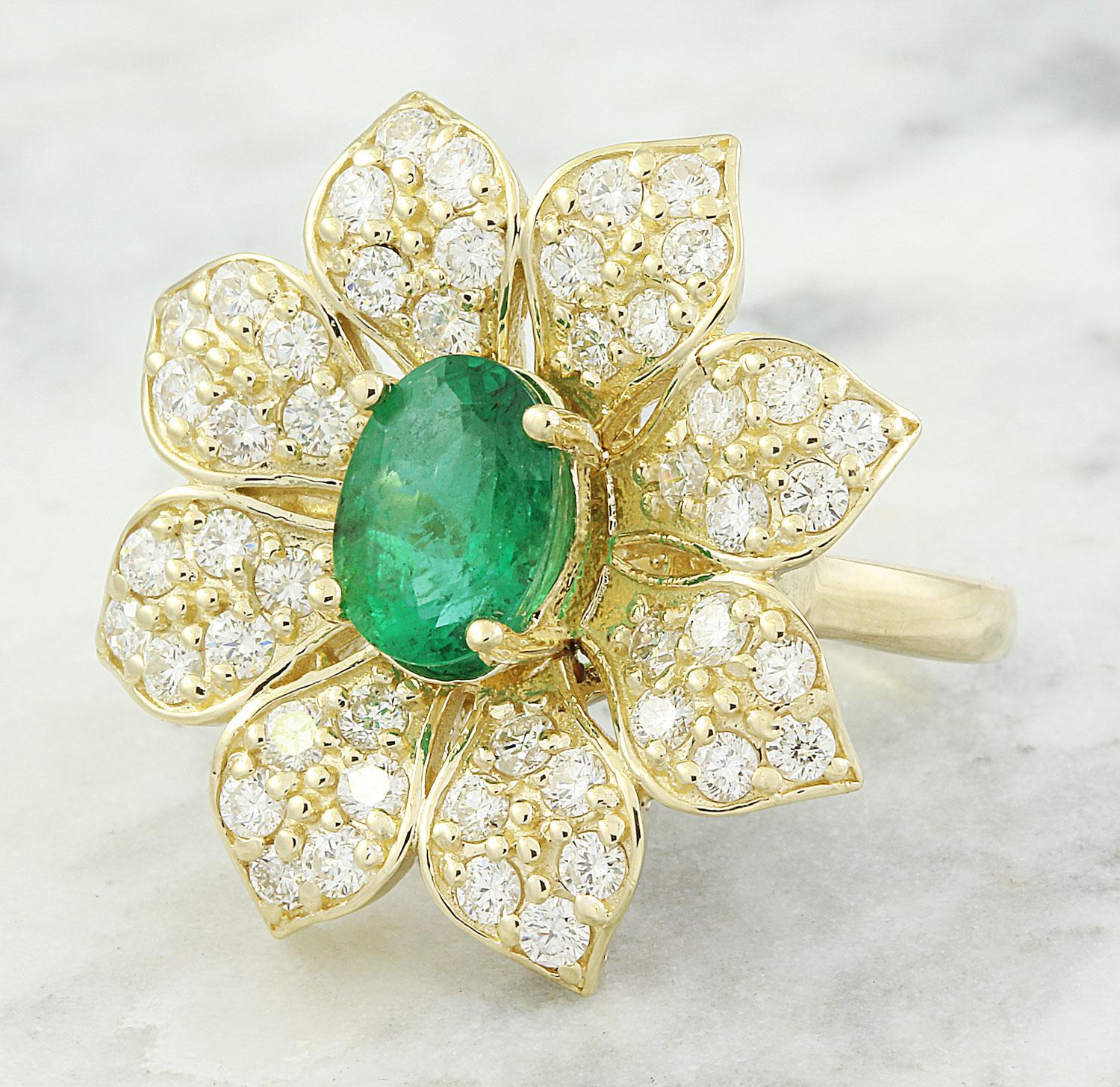 Presenting our stunning 14K Solid Yellow Gold Diamond Ring, featuring a mesmerizing 2.03 Carat Natural Emerald at its center, measuring 8.00x6.00 millimeters. Adorned with a sparkling 1.40 carat diamond, boasting F-G color and VS2-SI1 clarity.
