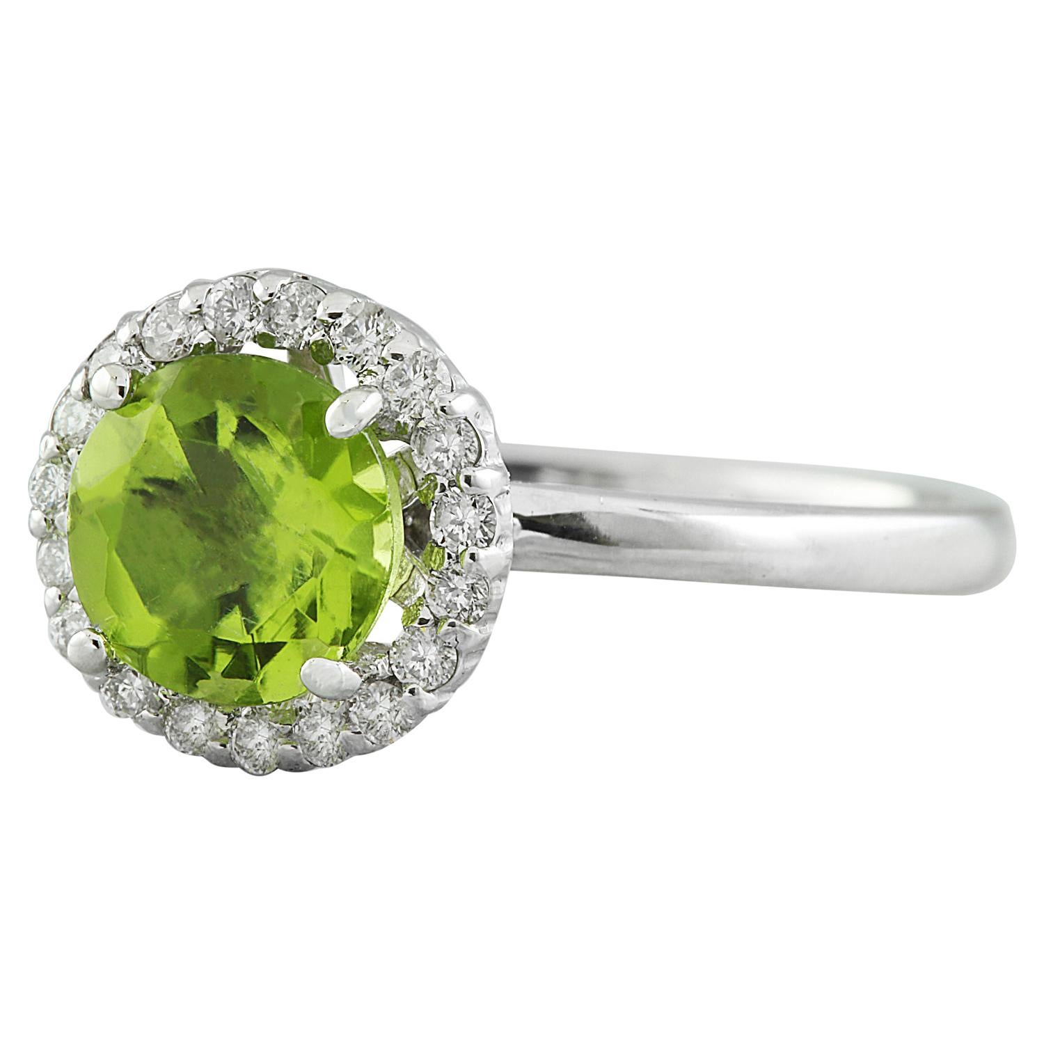 Elevate your style with our elegant 1.69 Carat Natural Peridot Ring, exquisitely crafted in solid 14K White Gold. This enchanting piece features a vibrant peridot gemstone weighing 1.49 carats, measuring 7.00x7.00 millimeters, showcasing its vivid