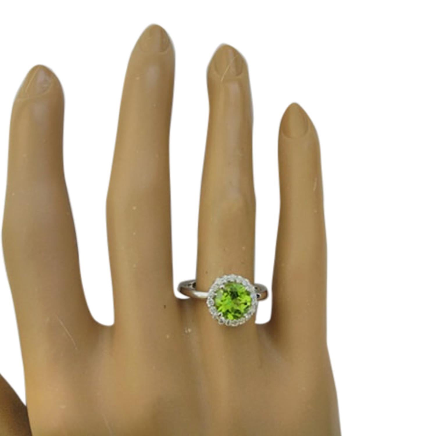 Women's Exquisite Natural Peridot Diamond Ring In 14 Karat White Gold  For Sale