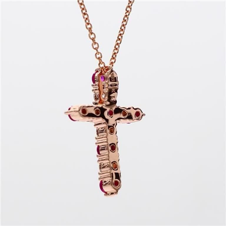 Contemporary Natural Round Red Ruby and White Diamond .83 Carat TW Rose Gold Cross Pendant For Sale