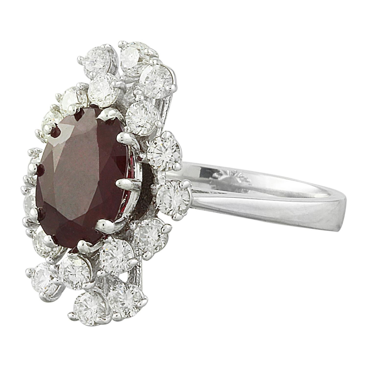 Introducing our exquisite 3.21 Carat Natural Ruby 14K Solid White Gold Diamond Ring, a true embodiment of sophistication and allure. This distinguished piece bears the authentic 14K stamp and weighs a total of 5.3 grams, promising both quality and