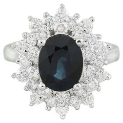 Bague exquise en or blanc 14 carats avec saphir naturel et diamants 