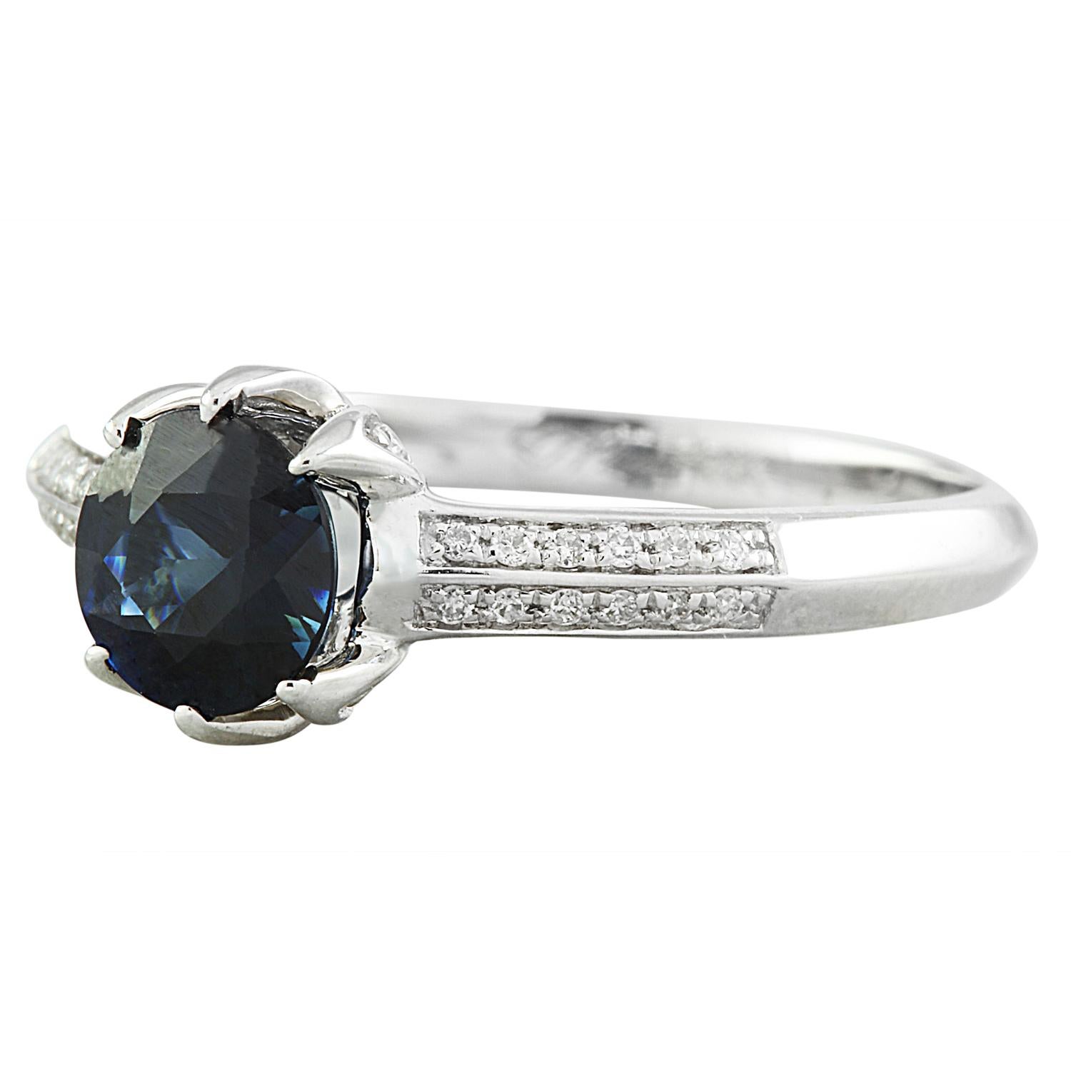 Introducing our exquisite 1.19 Carat Natural Sapphire 14K Solid White Gold Diamond Ring, a timeless symbol of beauty and grace.

This stunning ring is crafted with precision and stamped with 14K authenticity, boasting a total weight of 2.4 grams.