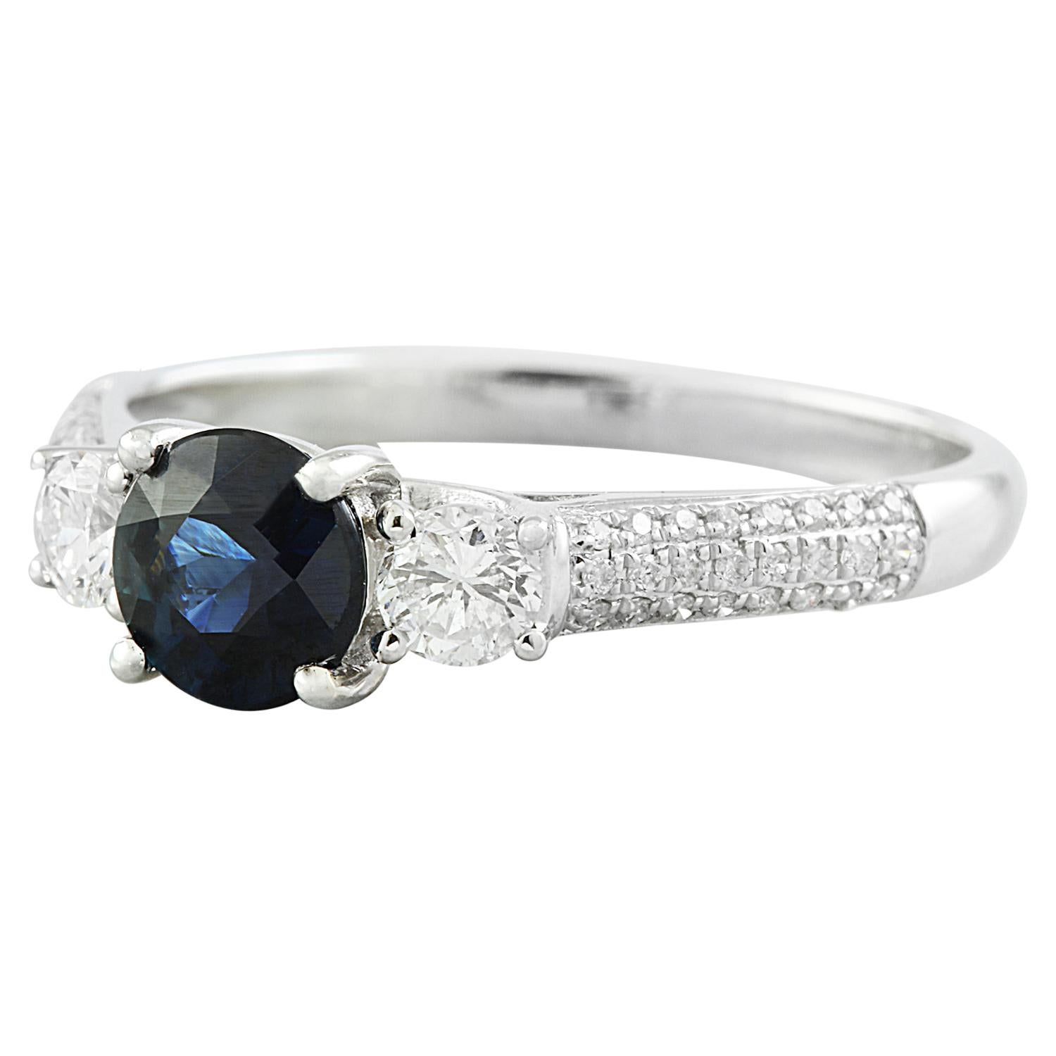 Introducing our stunning 14K Solid White Gold Diamond Ring, featuring a captivating 1.56 Carat Natural Sapphire. Stamped with authenticity, this ring exudes quality craftsmanship and timeless elegance. Weighing 2.4 grams in total, it showcases a
