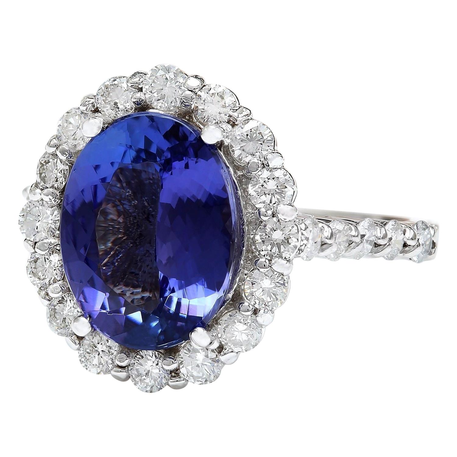 Indulge in elegance with our stunning 4.46 Carat Natural Tanzanite Ring, crafted in luxurious 14K White Gold. The centerpiece is a captivating oval-shaped Tanzanite, weighing 3.66 Carats and measuring 11.00x9.00 mm. Accompanying this mesmerizing gem