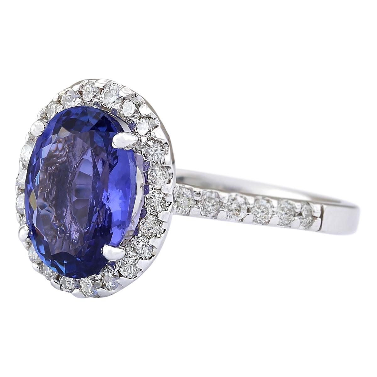 Presenting our exquisite 3.63 Carat Natural Tanzanite Ring, meticulously crafted in 14K White Gold. This stunning piece boasts a captivating Tanzanite gemstone weighing 3.03 carats, with dimensions of 10.00x8.00 mm, exuding a mesmerizing allure.