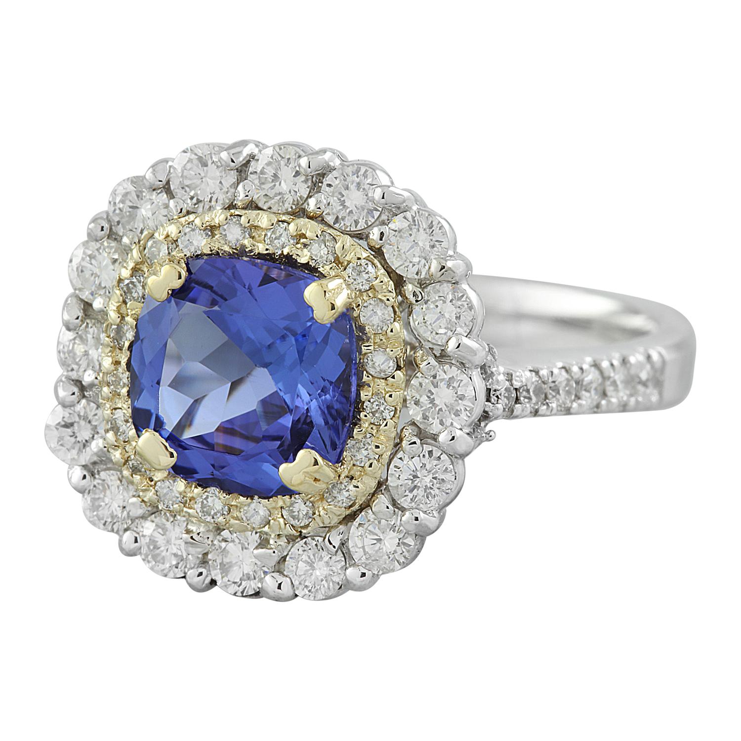 Introducing our exquisite Natural Tanzanite Diamond Ring, meticulously crafted in opulent 14K Two-Tone Gold. This captivating piece is a testament to timeless elegance and unparalleled craftsmanship, making it a perfect addition to your collection