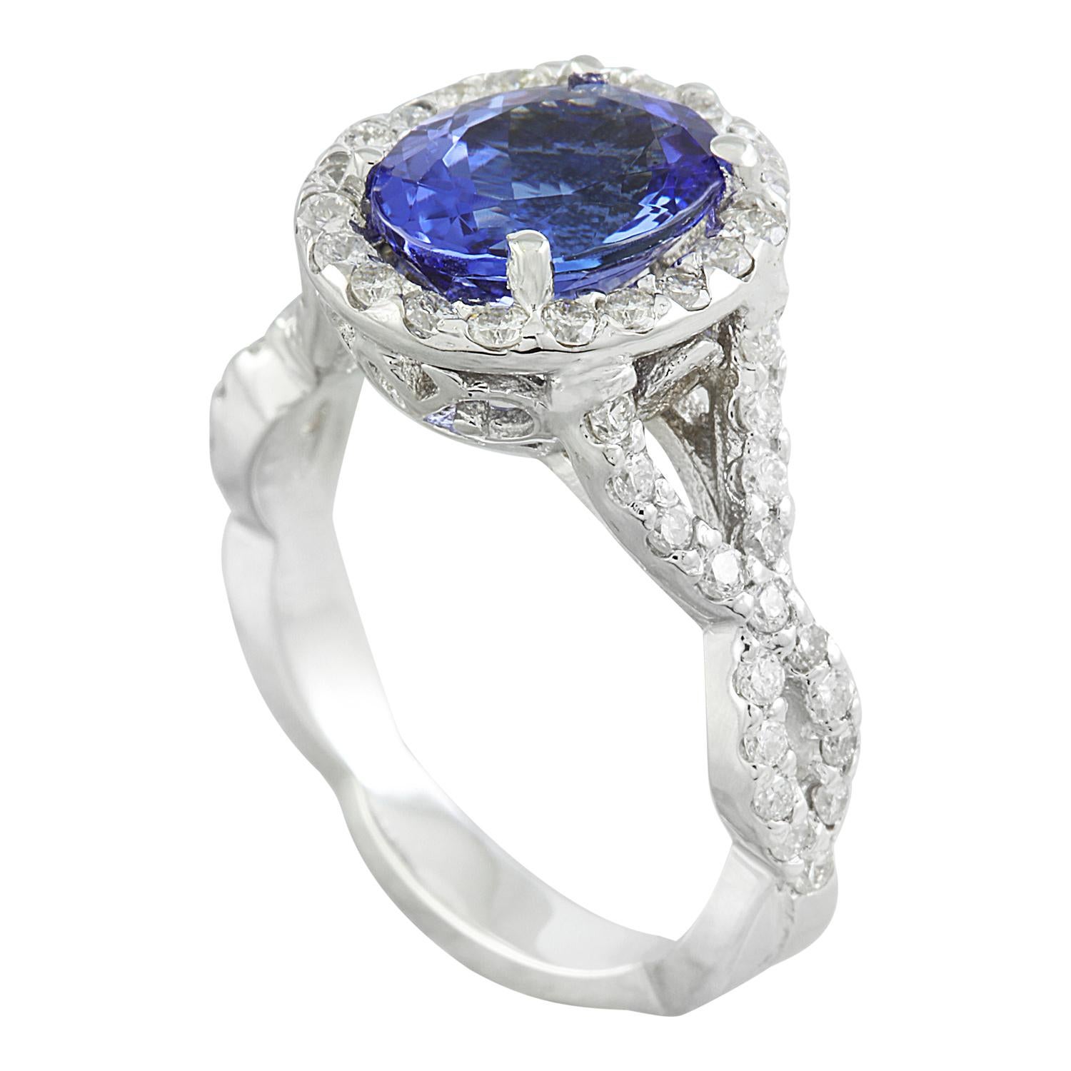 Introducing our captivating 3.23 Carat Natural Tanzanite Ring, exquisitely set in lustrous 14 Karat Solid White Gold. Authenticated with a stamped mark of 14K. Weighing 5.7 grams in total, it promises both comfort and durability. The centerpiece of